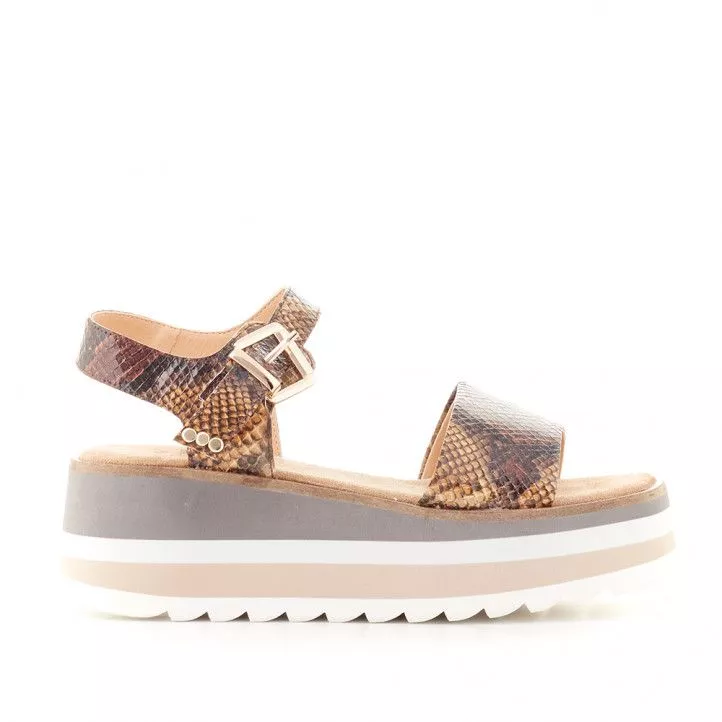 Alma Blue wedge sandals with colorful platform and animal print